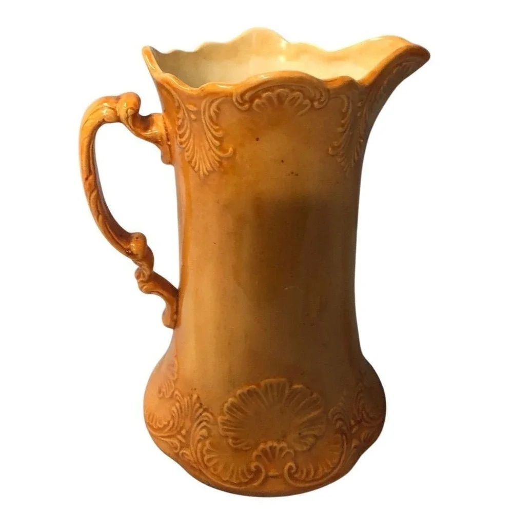 Victorian Style Embossed Porcelain Pitcher with Ornate Handle
